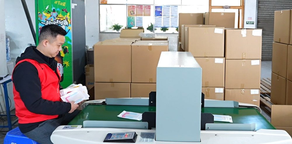 Automatic packaging line producing FBA-ready poly-bags and cartoning at Foamgrid